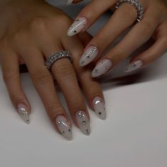 Star Nail Designs Simple, Plain New Years Nails, Short Almond Nails With Rhinestones, Studded Nail Art, Silver Celestial Nails, Almond Bday Nails, 2024 Almond Nails, Silver Detail Nails, Nails With Small Gems