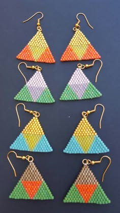 six different colored triangle shaped beaded earrings