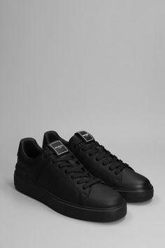 B court Sneakers in black leather, laces, rubber outsole, logo on heel, 100% leather, Made in ItalyGender: MenMaterial: LEATHERColor: BlackMade in: FRProduct ID: 366446_DM1VI288LVTR*Import tax/duty will be calculated at checkout (If applicable) Balmain Man, Balmain Men, Black Sneakers, French Design, Couture Collection, Luxury Retail, Luxury Boutique, Classic Black, Men's Shoes