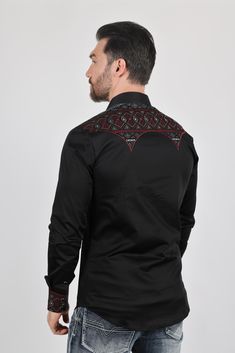 SIZE CHART Measurements: Model is wearing size Medium. Fabric: Cotton Fit: Relaxed Fit Description: Elevate your style with our Men's Modern Fit Stretch Multi-Color Aztec Embroidery Shirt, featuring exquisite embroidery that runs from the upper back, connecting to the shoulders, and linearly down the front beside the buttons. This black shirt boasts curved arrow details, adding a captivating touch to your ensemble. Details & Features: Premium cotton construction ensures comfort and durability Lo Black Embroidered Long Sleeve Shirt, Black Embroidered Cotton Shirt, Fitted Embroidered Red Shirt, Fitted Red Embroidered Shirt, Fitted Long Sleeve Shirt With Embroidery, Fitted Long Sleeve Embroidered Shirt, Aztec Embroidery, Arrow Designs, Curved Arrow