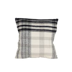 a black and white plaid pillow on a white background