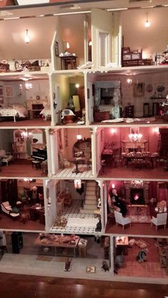 a doll house with all the furniture and accessories in it's display case,