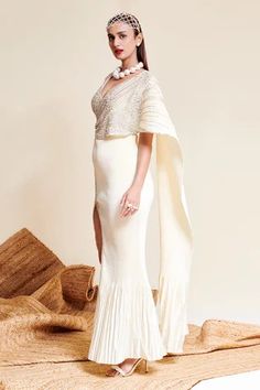 Shop for Reeti Arneja Ivory Georgette Meraki Beads Embroidered Pre-stitched Saree Gown for Women Online at Aza Fashions Embellished Off White Dress For Reception, Embellished Off-white Dress For Reception, White Embellished Dress With Cape Sleeves, White Embellished V-neck Gown, Hand Embellished Cream Dress For Reception, White Evening Dress With Traditional Drape, Elegant Off White Gown For Reception, White Hand Embellished Evening Gown, Off White Party Dress With Traditional Drape