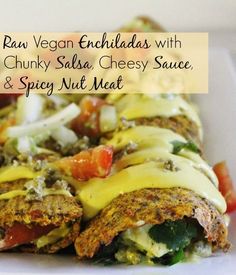 an enchiladas with chunky salsa, cheesy sauce and spicy nut meat