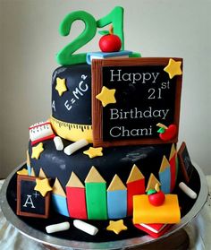 a birthday cake that is decorated with chalk and magnets