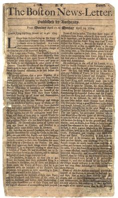 an old newspaper page with some writing on it