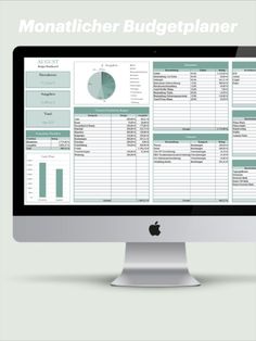 a computer monitor with the words monarch budget planner on it and an image of a pie chart