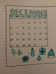 the december calendar is drawn on a piece of paper