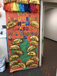 a bulletin board with taco - bout and awesome words on it