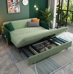 a living room with a green couch and coffee table on top of the rugs