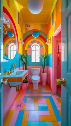 a brightly colored bathroom with potted plants in the corner