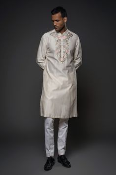 Ivory straight chanderi silk kurta with floral resham hand thread embroidery on the placket and cuffs. Paired with a churidar. - Aza Fashions Luxury Men's Churidar With Resham Embroidery, Ceremonial Slub Silk Kurta With Resham Embroidery, Floor-length Slub Silk Kurta With Resham Embroidery, White Embroidered Slub Silk Kurta, Mens Embroidered Kurta, Kurta Patterns, Rohit Bal, Blooming Rose, Churidar