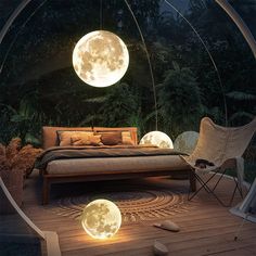 a bed sitting in the middle of a wooden floor under a full moon lit bedroom