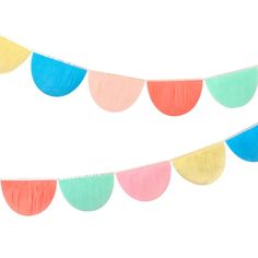 a paper garland with pastel colors on it