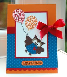 a card with an owl holding a balloon