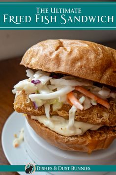 the ultimate fried fish sandwich on a plate