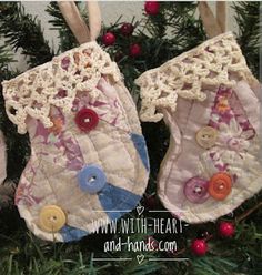 three christmas stockings hanging from a tree