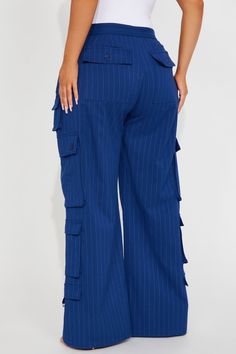 Available In Navy. Trouser Pant Mid Rise Button & Zip Closure Wide Leg Cargo Pockets Zippered Details Non-Stretch Disclaimer: Stripe Placement Will Vary. 65% Polyester 33% Rayon 2% Spandex Imported | After Hours Pinstripe Trouser in Navy Blue size Small by Fashion Nova Search By Photo, Mexican Peso, Navy Fashion, After Hours, Zipper Detail, Trouser Pants, Fashion Nova, Mid Rise, Wide Leg