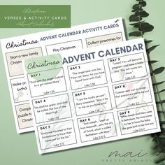 the printable christmas calendar is next to some plants