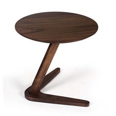 a small wooden table with one leg on the other side and an end table in the middle