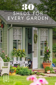 a garden shed with flowers and potted plants