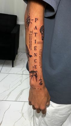 a man with a tattoo on his arm that has words written in different languages and insects