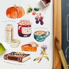 an illustration of autumn food and drinks on a table next to a chalkboard with markers