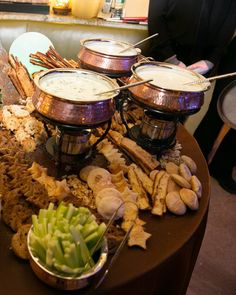 an assortment of food is displayed on a table