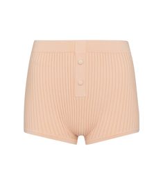 For loungewear with a touch of vintage inflection, look no further than these peach-pink shorts from Live The Process. Ribbed-knit to mold to the body for a close, comfortable fit, they're framed with tonal covered buttons. Style yours with the label's coordinating crop top. Ribbed Bottoms For Summer Lounging, Ribbed Short Leg Loungewear Bottoms, Ribbed Loungewear Bottoms With Short Legs, Summer Ribbed Bottoms For Lounging, Summer Ribbed Lounging Bottoms, Ribbed Summer Shorts With Short Legs, Ribbed Summer Shorts, Ribbed Loungewear Shorts, Ribbed Beige Bottoms For Summer