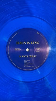 a blue record with the words jesus is king on it