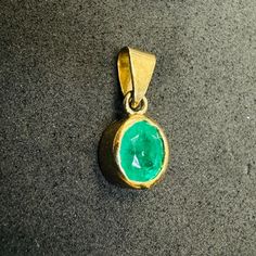 17x10mm with the bail. Marked 18K The bail is 8x4mm Elegant Untreated Oval Pendant Jewelry, Elegant Untreated Pendant Jewelry, 14k Gold Oval Jewelry With Bail, Luxury 14k Gold Jewelry With Oval Bail, Colombian Emeralds, Miami Fl, Charm Pendant, Chains Necklace, Favorite Jewelry