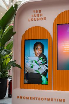 A photo of the video gallery wall with the hashtag #amomentofmetime at the base Vertical Screen, Panel Event, Curved Photo Backdrop, Retail Pop Up, Backdrop Brand Event, Exhibition Booth Design Ideas Creative, Curved Exhibition Stand, Corrugated Wall, Curved Led Screen Stage Design