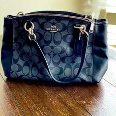 Mini Christie Handbag. Never Used. Sat In Closet For Over A Year. Perfect Condition Except I Lost The Shoulder Strap During A Move! Crossgrain Leather, Inside Snap And Multifunction Pockets. Snap Closure And Fabric Lining. $175 Obo Coach Shoulder Bag With Top Carry Handle For On-the-go, Coach Tote Shoulder Bag With Top Carry Handle, Coach Handheld Bag With Zipper Closure, Coach Shoulder Bag With Top Handle, Coach Shoulder Bag With Top Carry Handle, Handheld Coach Bags With Zipper Closure, Coach Tote Satchel With Zipper Closure, Coach Shoulder Satchel With Zipper Closure, Coach Double Handle Bag With Zipper