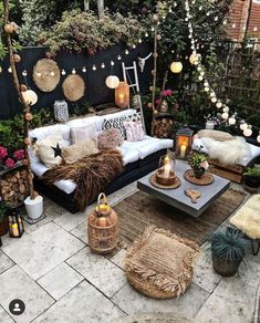 a living room filled with lots of furniture and plants on top of it's walls