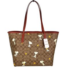 Coach X Peanuts City Tote In Signature Canvas With Snoopy Woodstock Print. New With Tag. Guaranteed Authentic. Limited Edition Coach X Peanuts Collaboration. Signature Coated Canvas And Smooth Leather. Inside Zip Pocket. Snap Closure. Handles With 10” Drop. 13”L X 11 1/2”H X 6 1/4”W. Ships Fast With Care From A Non-Smoking, Pet-Free Environment. Unit#C23024 Snoopy Woodstock, Girly Bags, Bags Coach, Signature Canvas, Snoopy And Woodstock, Woodstock, Top Rated, Womens Tote Bags, Coach Bags