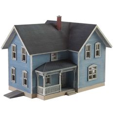 a toy house with a porch and two levels on the front, one level above the other