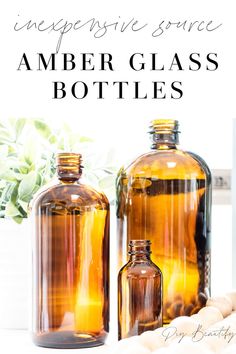 two bottles filled with amber glass are sitting next to each other