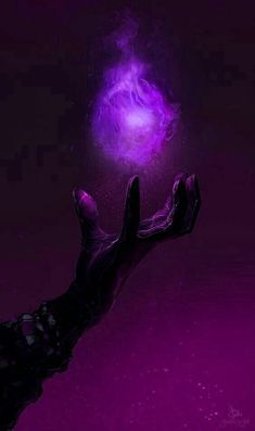 a hand reaching up towards a purple light