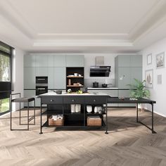 a modern kitchen with wood floors and white walls