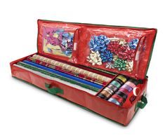 a red suitcase filled with lots of different types of wrapping