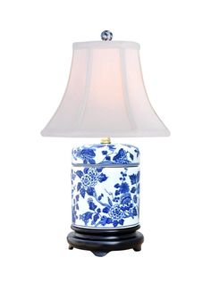 B/W PORCELAIN CANTON FLORAL COVER JAR LAMP 18"HIGH 10" WIDE LAMP BODY HEIGHT: 9.4" LAMP BASE DPTH AND WIDTH: 6.3" X6.3" IN LINE SWITCH MAXIMUM 60W, UL LISTED SHADE CODE: B/10HOW REGULAR BELL 10" OFF WHITE Artisan Craftsmanship: We want to emphasize that each of our porcelain creations is meticulously handcrafted by skilled artisans. As a result, every piece is distinctive and might display subtle variations in color, size, and design. The artistry inherent in our products contributes to their uniqueness, making each item truly exceptional. Illustrative Imagery: The image accompanying this listing serves as a visual reference for the item you will receive. However, given the artisanal nature of our products, there could be minor disparities in color, form, and dimensions between the image a Lamp With Rattan Shade, Jar Table Lamp, Ginger Jar Lamp, Visual Reference, White Ginger Jars, Rattan Shades, Small Lamp, Jar Lamp, Lamp Base