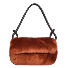 Super luxurious statement sheepskin bag our Whitby, shown here in Burnt orange shearling that oozes quality. Lightweight, Lined with extra large leather zipper internal pocket.  The deluxe leather handle, generously proportioned for your comfort, accommodates even the chunkiest winter coats, allowing you to carry Whitby in style effortlessly. The interior of Whitby is lined with our classic British cotton twill fabric, showcasing both durability and sophistication. 100% sheepskin. made in Englan Leather Evening Bags For Winter, Brown Sheepskin Bags For Winter, Brown Leather Bag With Faux Fur Lining, Winter Leather Shoulder Bag With Faux Fur Lining, Brown Sheepskin Bag With Faux Fur Lining, Fall Brown Shoulder Bag With Faux Fur Lining, Brown Shoulder Bag With Faux Fur Lining For Fall, Brown Faux Fur Rectangular Shoulder Bag, Brown Sheepskin Shoulder Bag For Everyday Use