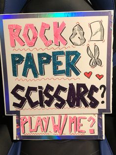 a sign that says rock paper scissors play wine