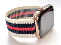 an apple watch band with red, white and blue stripes