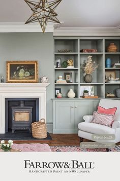 a living room filled with furniture and a fire place in the middle of it's walls