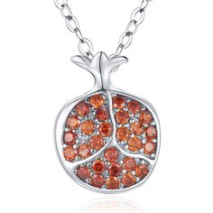 PRICES MAY VARY. Introducing our stunning Cubic Zirconia Pomegranate Necklace, a breathtaking piece that encapsulates the beauty and symbolism of this beloved fruit. Crafted with exquisite attention to detail, this necklace is a captivating blend of elegance and sparkle. Solid 925 Sterling Silver: no Lead, no nickel and hypoallergenic. This pomegranate pendant necklace will not turn your skin green. Adjustable Chain: 18 in chain plus 2 in adjustable extender, this garnet pomegranate necklace is Cute Dainty Jewelry, Garnet Pomegranate, Pomegranate Pendant, Red Necklaces, Pomegranate Necklace, Pomegranate Jewelry, Fruit Necklace, Fruit Jewelry, Zirconia Necklace