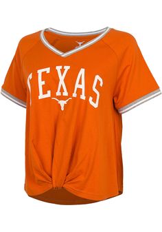 Let everyone know who you root for in this Texas Longhorns Burnt Orange Channing Short Sleeve T-Shirt! This Texas Short Sleeve Tee features a center chest graphic with yarn dye ribbed neck and sleeve trim. Raglan sleeves, Ribbed neckline and cuffs, Twist front hem, 100% Cotton Collegiate Cotton T-shirt With Ribbed Cuffs, Varsity Tops For College In Spring, Varsity Tops For College Spring Season, Spring Varsity Tops For College, Varsity Style Loungewear Tops With Ribbed Cuffs, Varsity Style Top With Ribbed Cuffs For Loungewear, Collegiate Style Relaxed Fit Top With Ribbed Cuffs, Collegiate Style Top With Ribbed Cuffs In Relaxed Fit, Relaxed Fit Collegiate Tops With Ribbed Cuffs