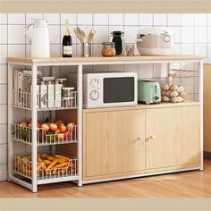 a microwave oven sitting on top of a kitchen counter next to a shelf filled with food