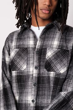 When it comes to the perfect closet staple, nothing keeps you looking cool and staying warm quite like a Heavy Flannel Shacket. One of our most popular designs, this combination jacket shirt is the perfect outerwear all year long. Pick your favorite flannel and hit the streets with your fresh new drip! Though it may have the silhouette of your average button-down shirt, complete with deep chest pockets, a spread collar, thick cuffs, and buttons down the front, our shacket is made with a breathab Black And White Flannel, Layered Fashion, Jogger Shorts, Knit Shorts, Sweatshirt Shirt, Navy Color, Mens Outerwear, Hoodie Top, Flannel Shirt