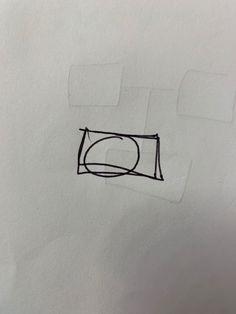 a piece of paper that has some type of object drawn on it and is in the shape of a rectangle